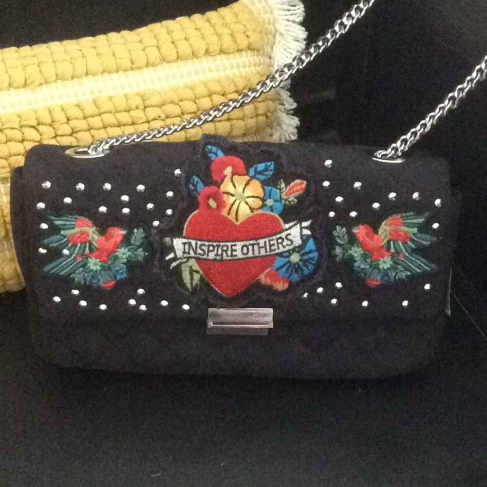 Zara studded patched bag “inspire others “